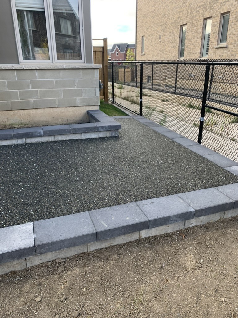 permeable walkway with retaining wall border